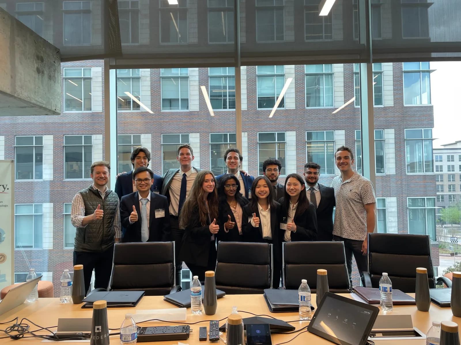 TASK members visiting a consulting firm office on the TASK Trip.