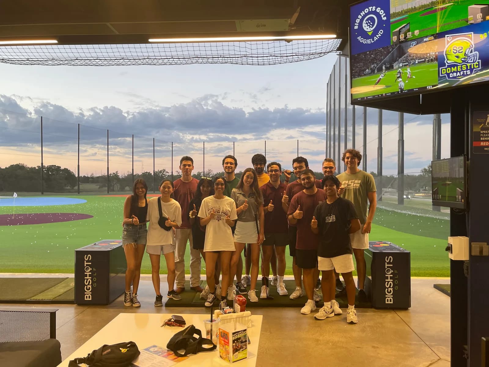 Members at a Topgolf social.