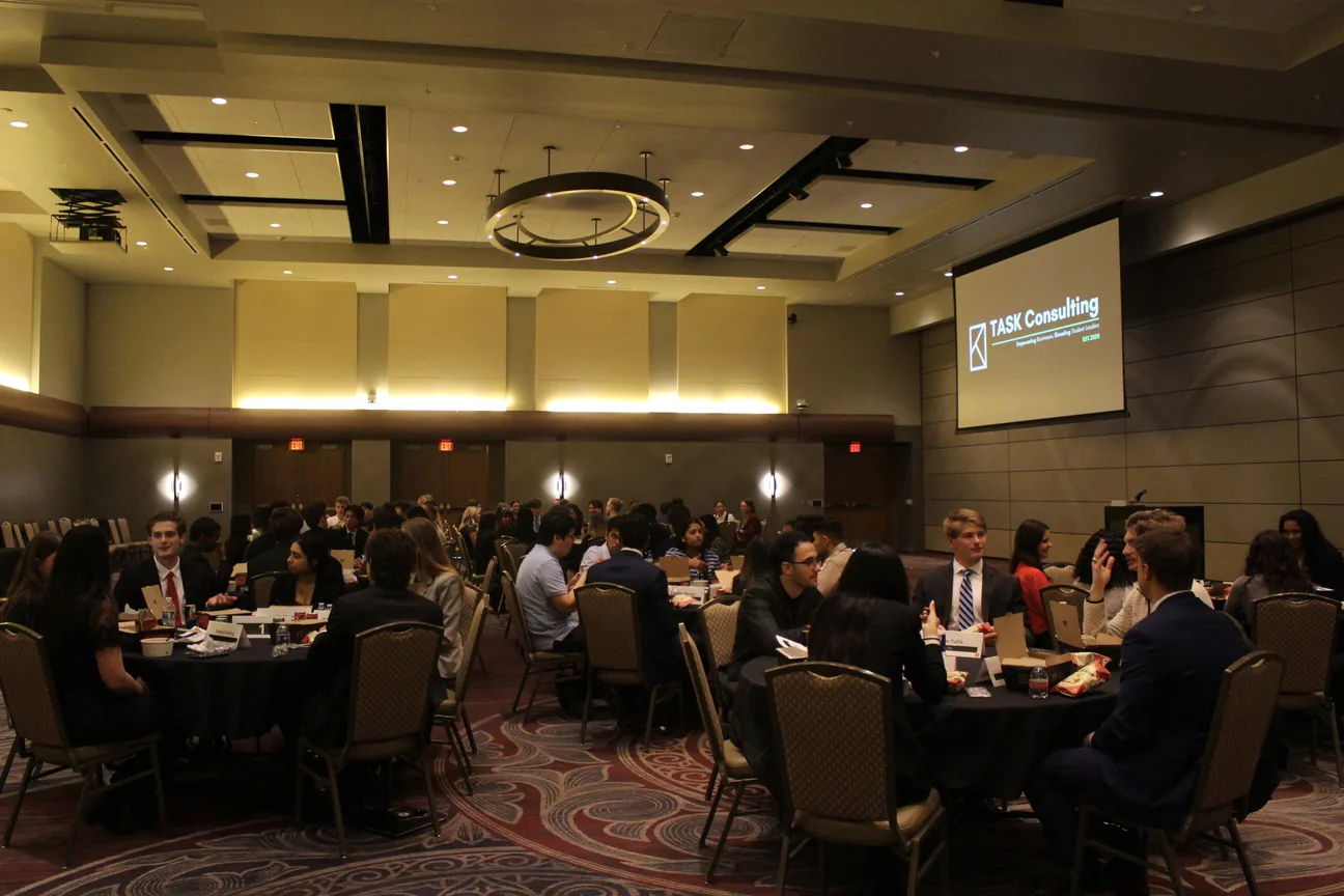 Students and company representatives at tables during the TASK Consulting Career Fair.